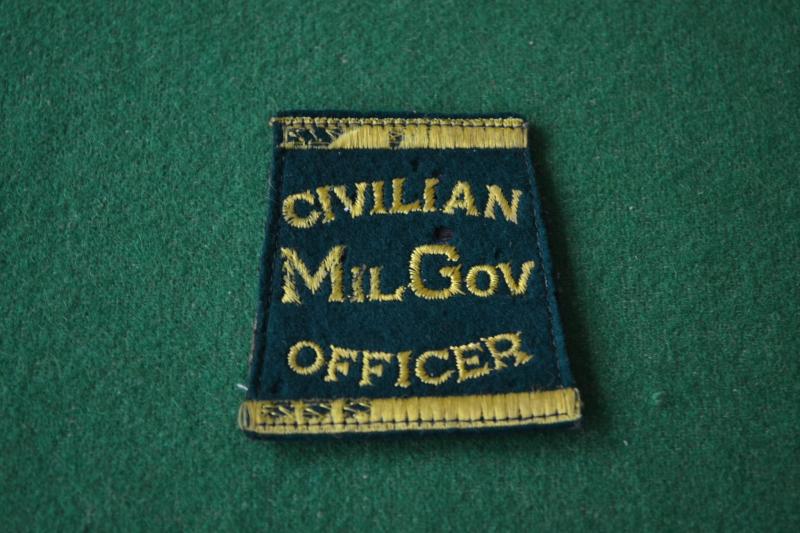 Civilian Military Government Officer.