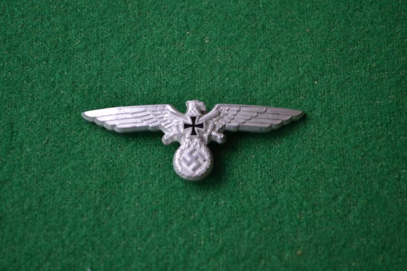 NSKOV Cap Badge.